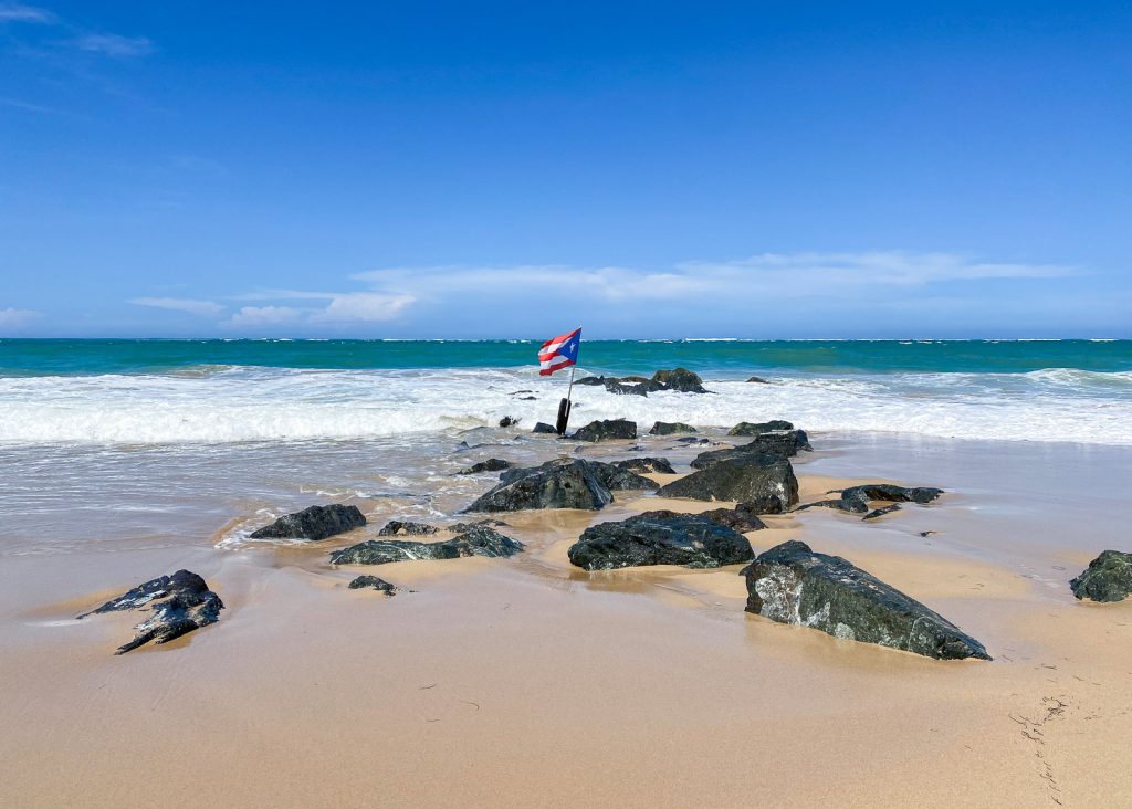 Puerto Rican flag on the beach in Condado, San Juan