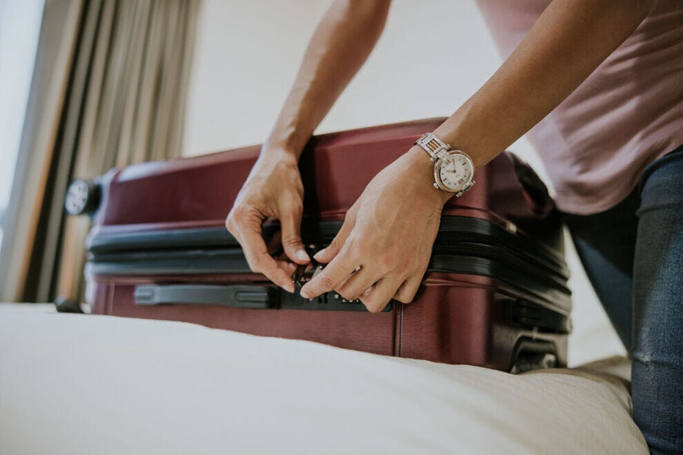 Securing a lock to luggage