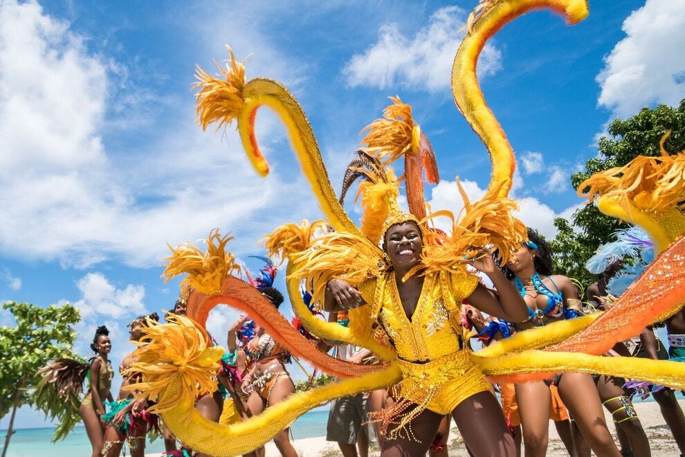 The Grand Kadooment Parade in Barbadas culminates with a dip in the sea