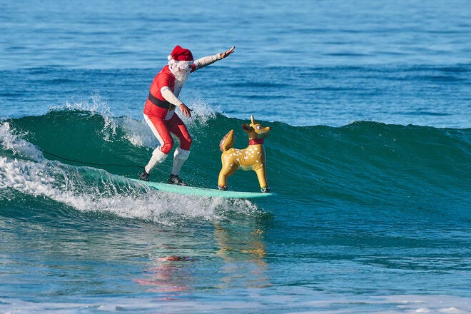 Watch a lot of Santas hang 10 in Dana Point, California