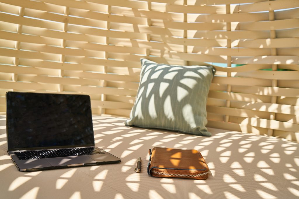 Laptop on a lounge chair